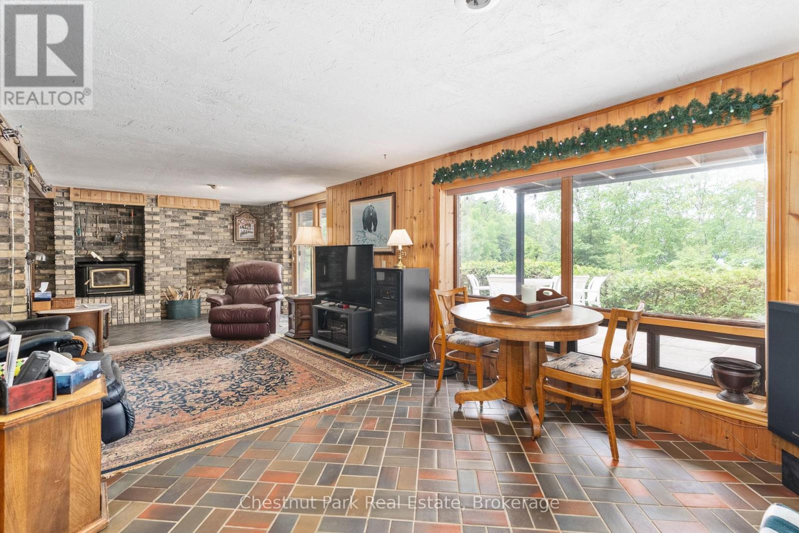 652 North Waseosa Lake Road, Huntsville (Chaffey), ON - Indoor Photo Showing Other Room With Fireplace