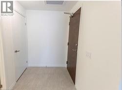 Hallway with baseboards -