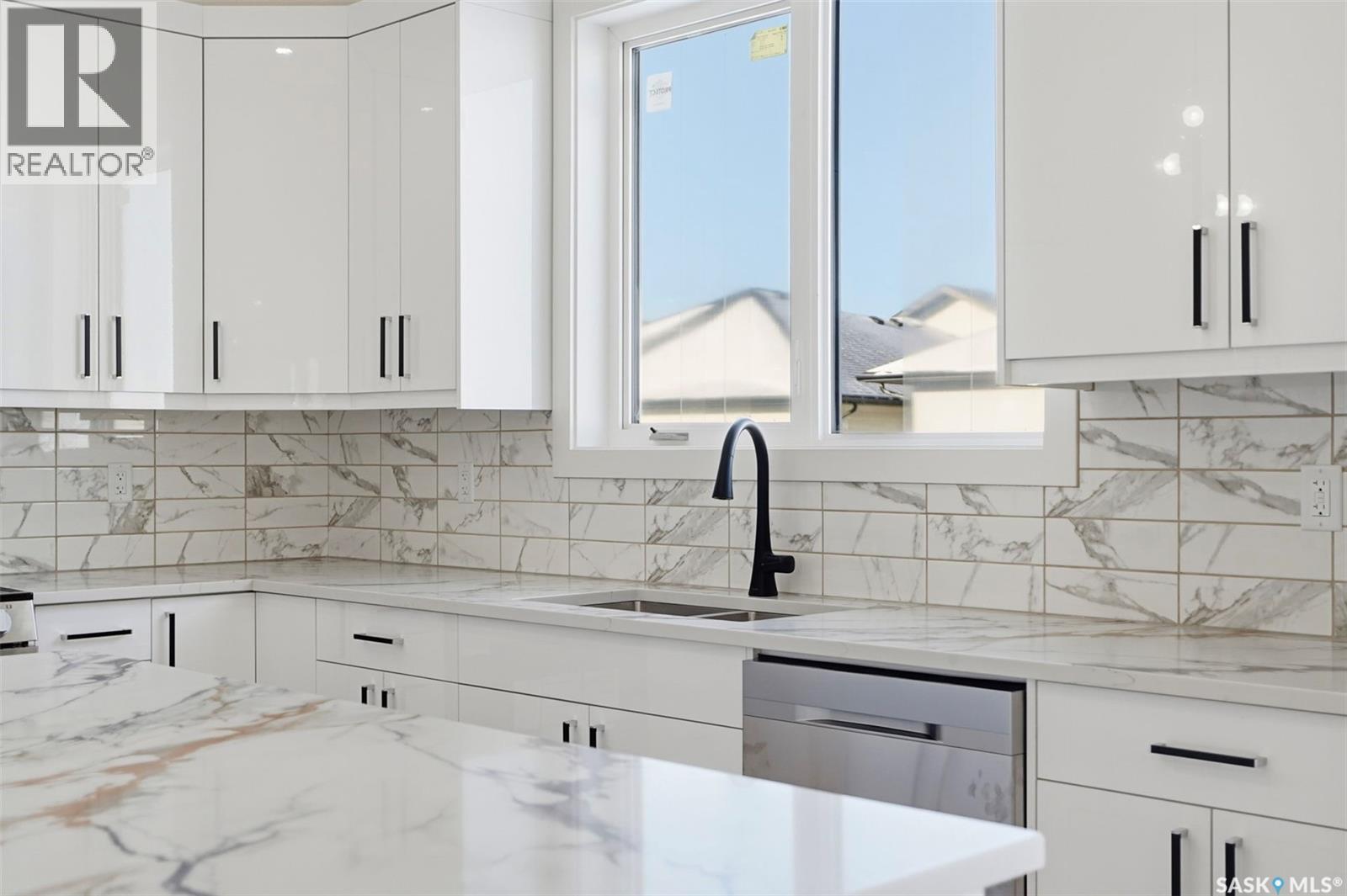 151 Sharma Lane, Saskatoon, SK - Indoor Photo Showing Kitchen With Double Sink With Upgraded Kitchen