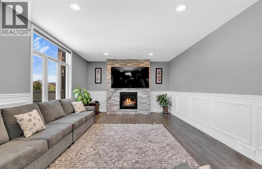 1099 Vincent Crescent, Lakeshore, ON - Indoor Photo Showing Living Room With Fireplace