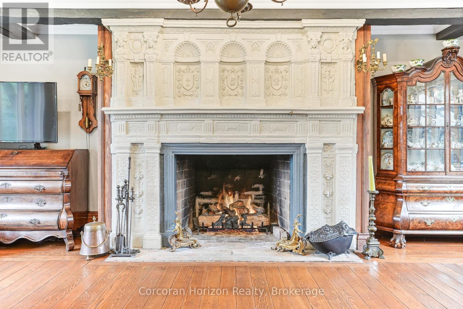 353 Sulphur Springs Road, Hamilton (Ancaster), ON - Indoor Photo Showing Living Room With Fireplace