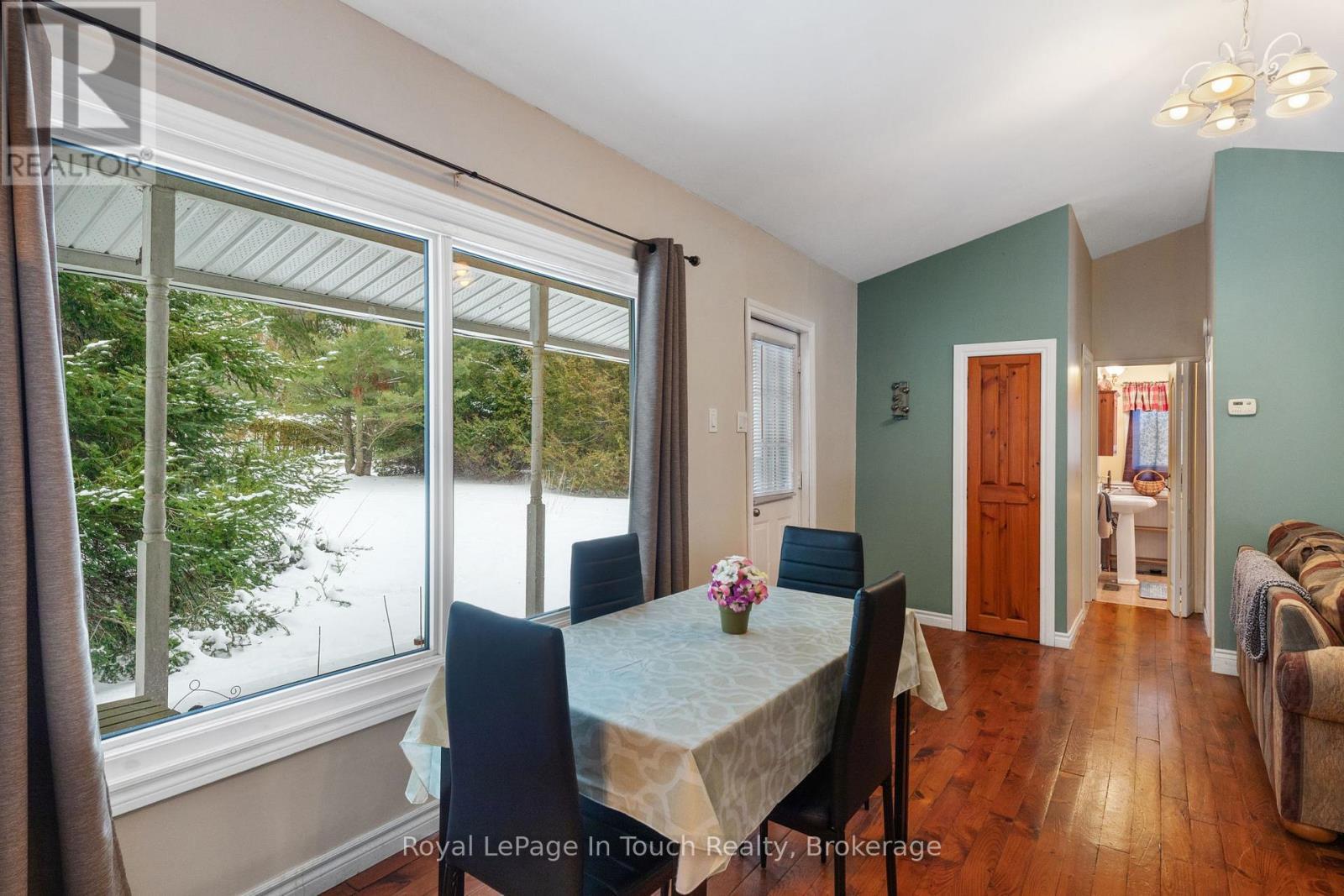 Large Picture Window by the Eating Area - 2198 Champlain Road, Tiny, ON - Indoor Photo Showing Dining Room