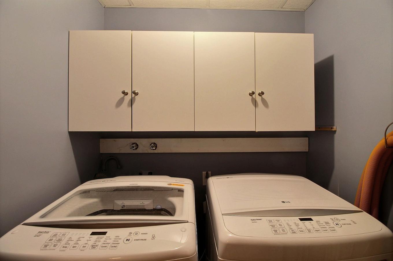 Salle de lavage - 55 Rue Pierre-Bouliane, La Malbaie, QC - Indoor Photo Showing Other Room