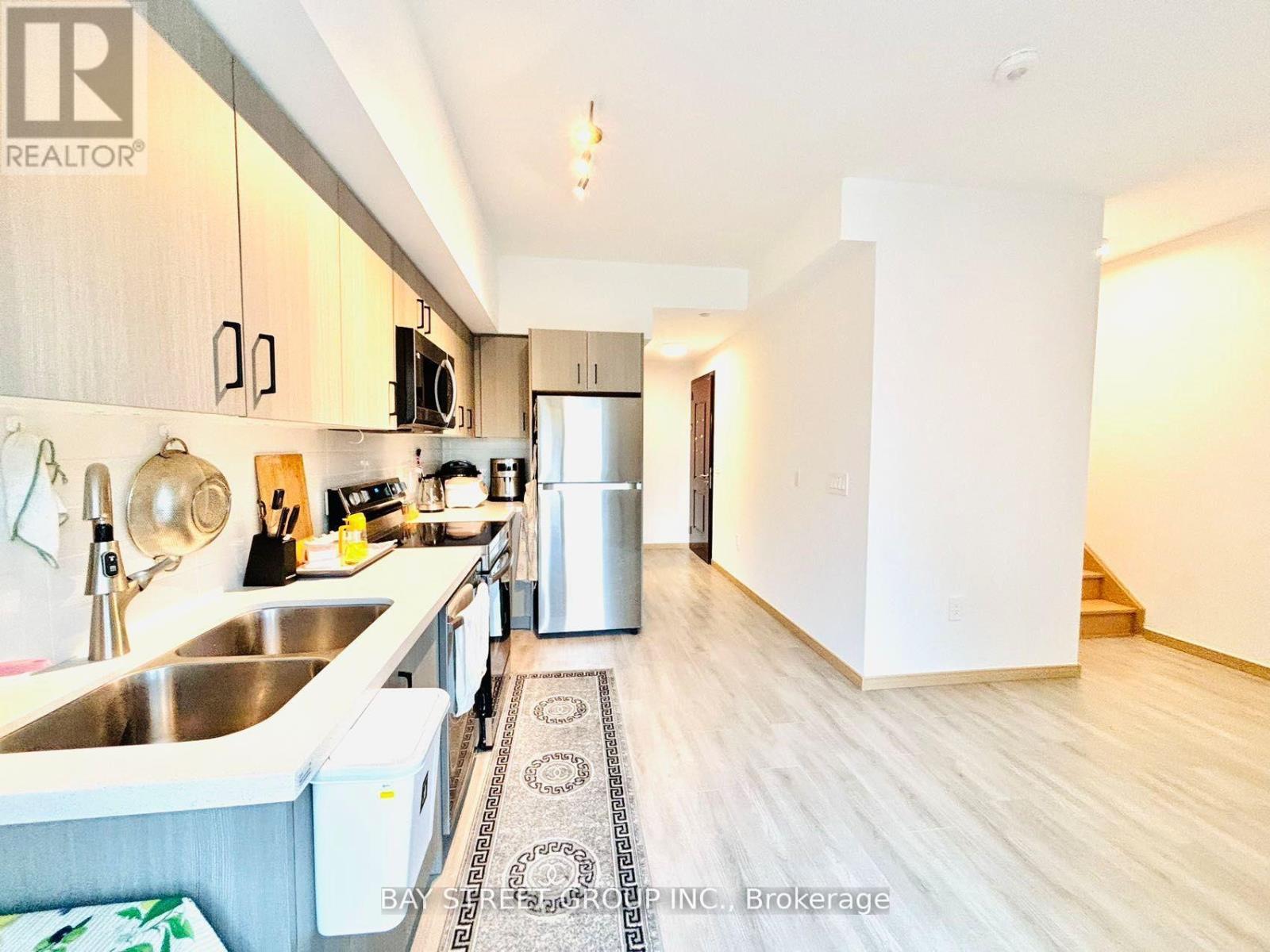 308 - 3427 Sheppard Avenue E, Toronto, ON - Indoor Photo Showing Kitchen With Double Sink