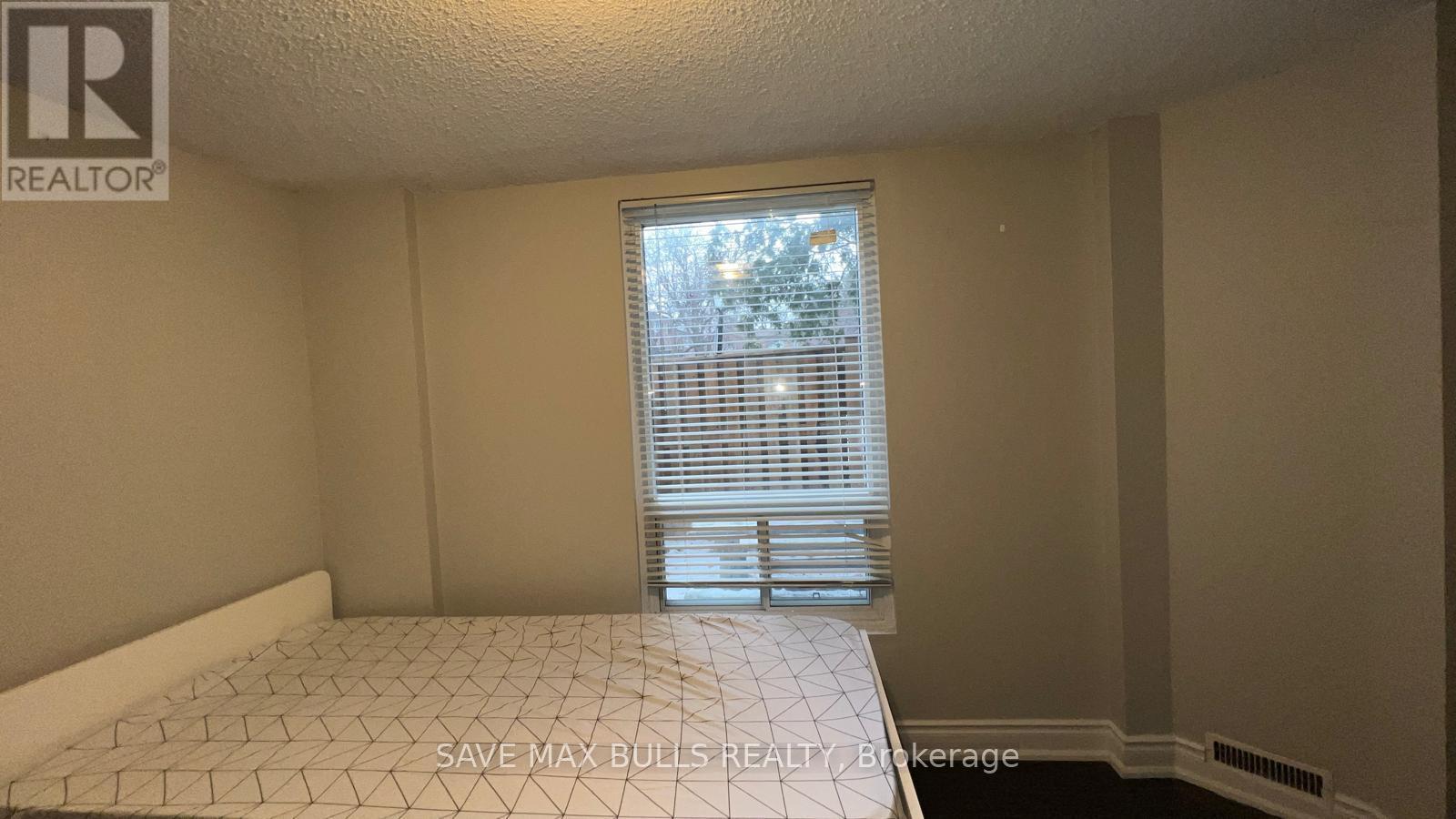 28 (Basement Studio) - 7030 Copenhagen Road, Mississauga, ON - Indoor Photo Showing Bedroom