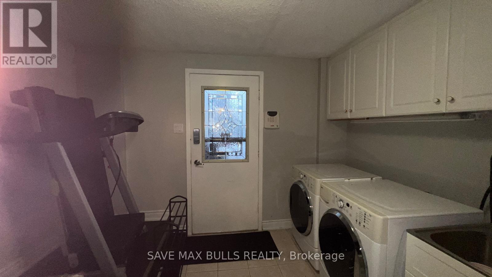 28 (Basement Studio) - 7030 Copenhagen Road, Mississauga, ON - Indoor Photo Showing Laundry Room