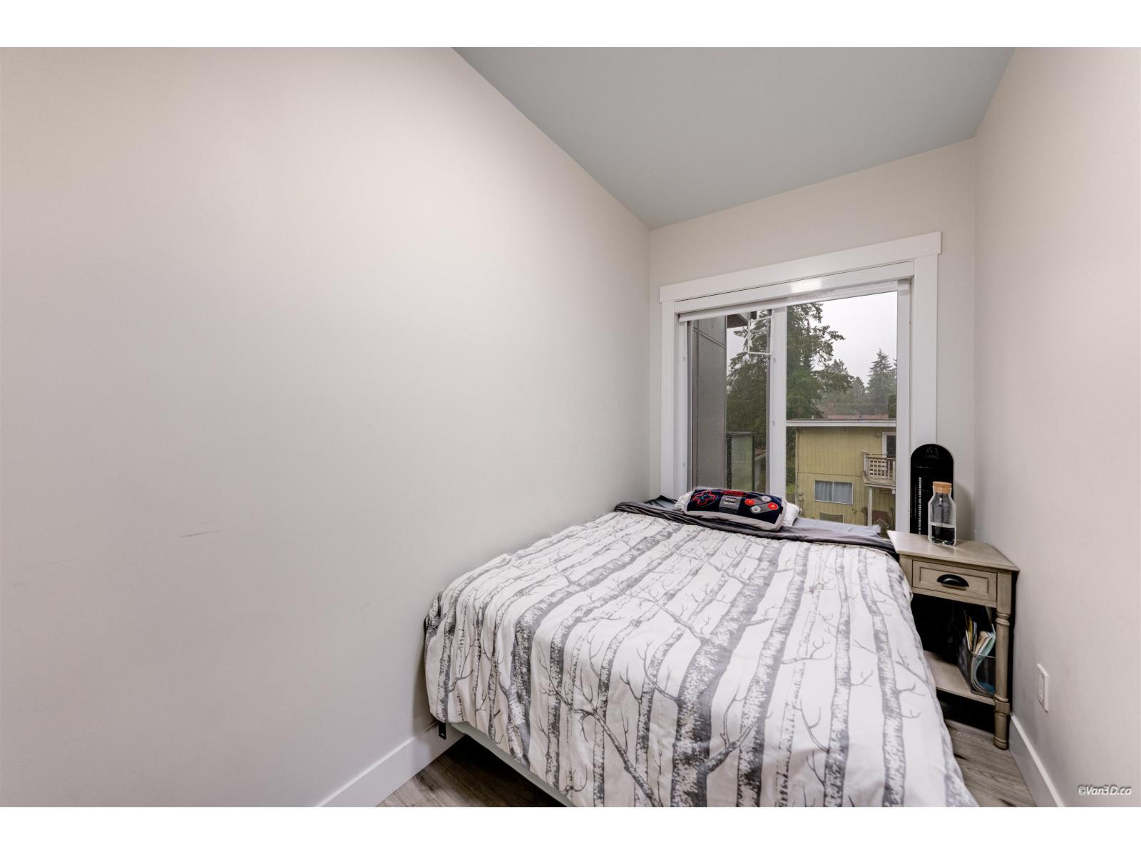 207 13799 101 Avenue, Surrey, BC - Indoor Photo Showing Bedroom
