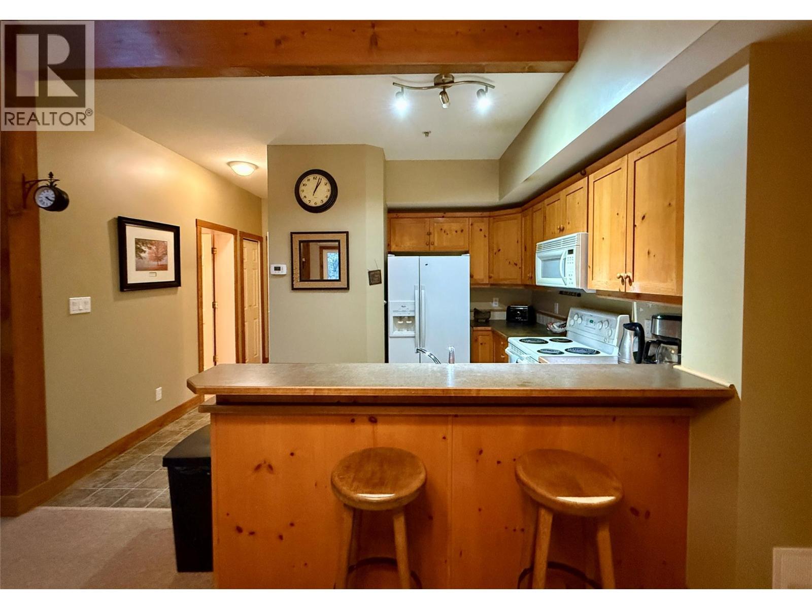 300 Stemwinder Drive Unit# 210, Kimberley, BC - Indoor Photo Showing Kitchen With Double Sink
