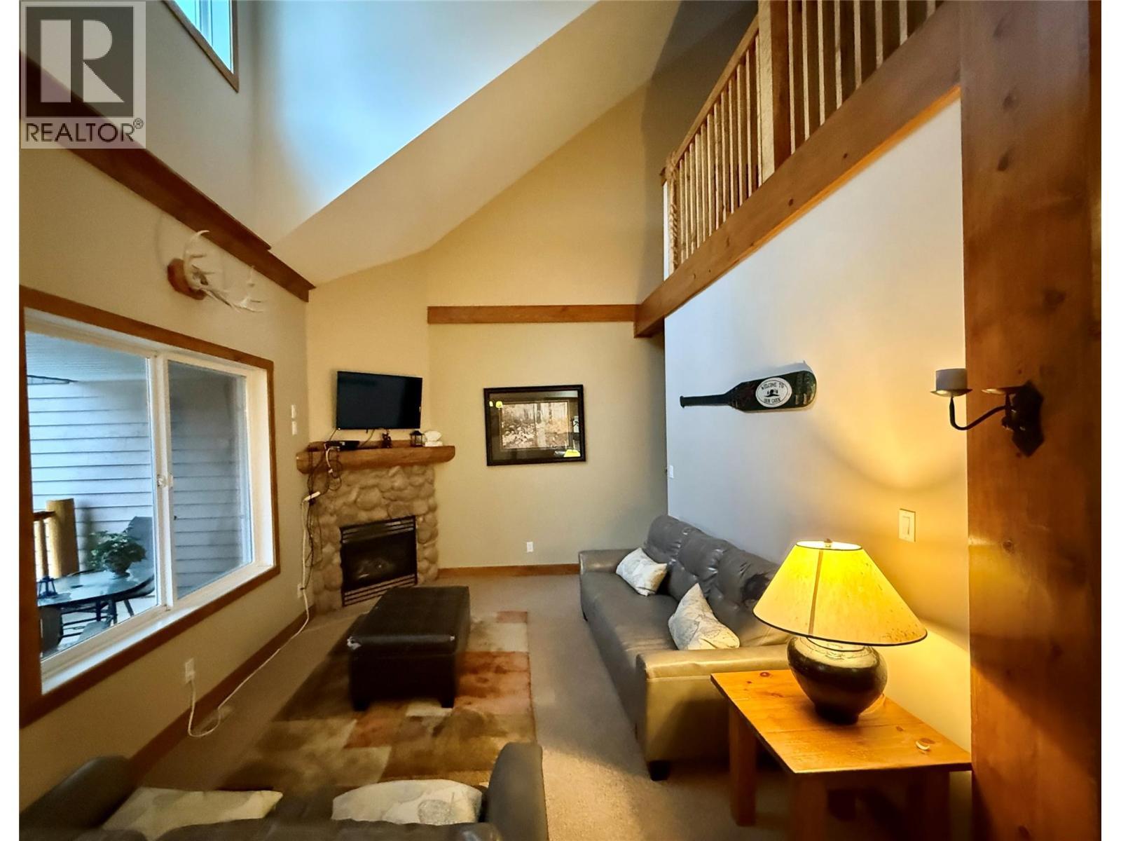 300 Stemwinder Drive Unit# 210, Kimberley, BC - Indoor With Fireplace