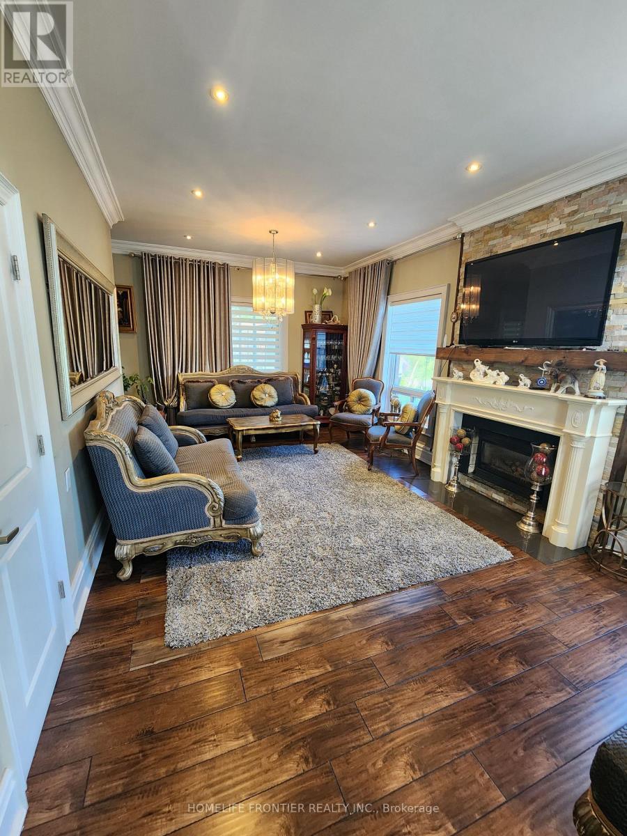 3 Mandalane Drive, King, ON - Indoor Photo Showing Living Room With Fireplace