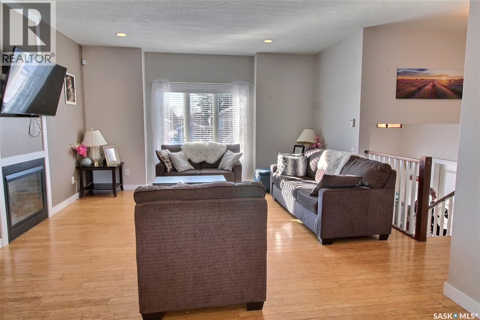 857 Madsen Place, Prince Albert, SK - Indoor Photo Showing Living Room With Fireplace