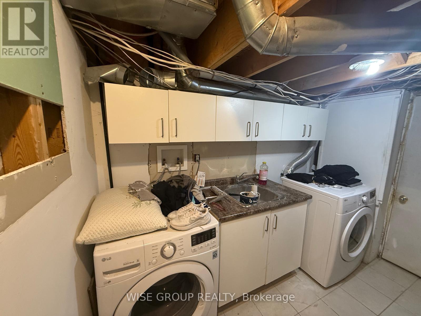 Basement - 55 Purdy Crescent, Toronto, ON - Indoor Photo Showing Laundry Room