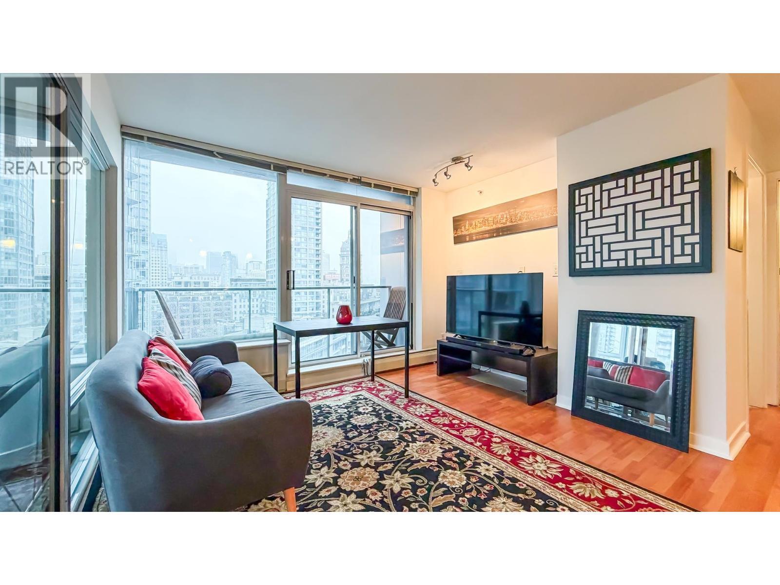 1606 688 Abbott Street, Vancouver, BC - Indoor Photo Showing Living Room With Fireplace