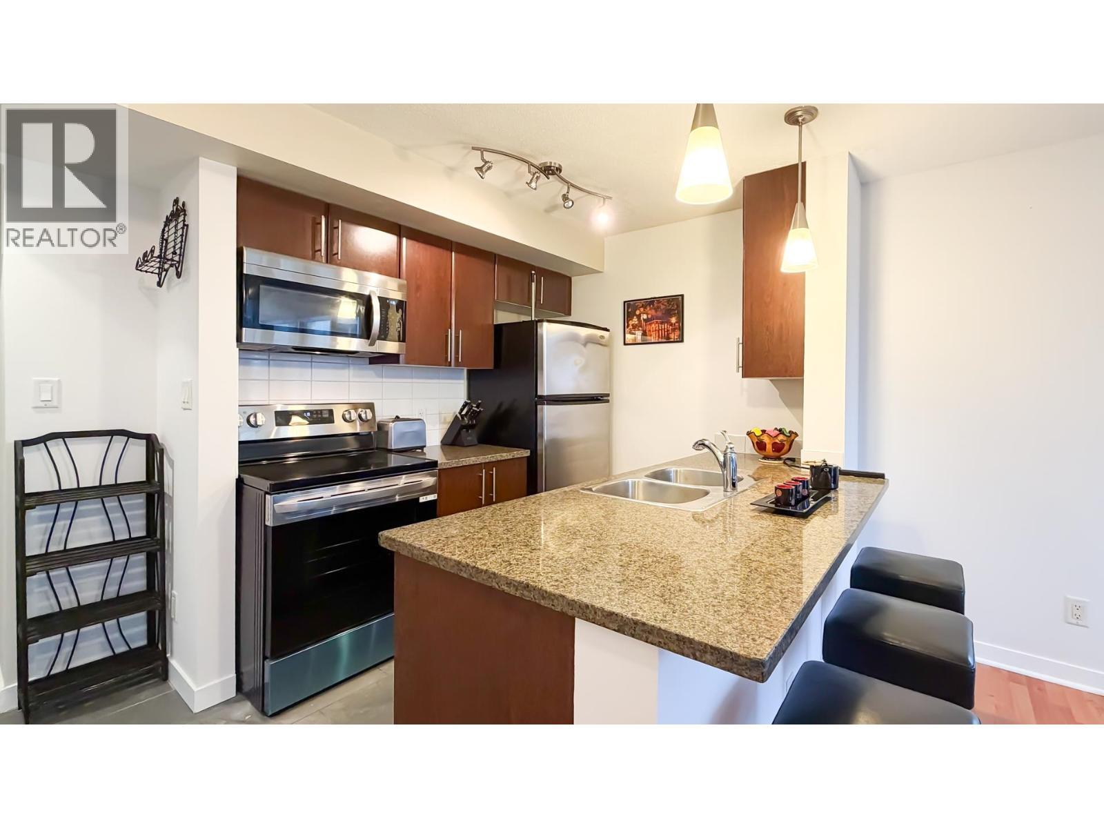 1606 688 Abbott Street, Vancouver, BC - Indoor Photo Showing Kitchen With Double Sink