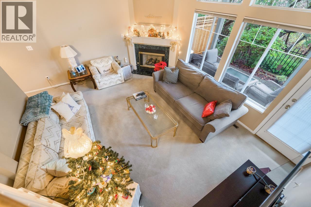 233 Waterleigh Drive, Vancouver, BC - Indoor Photo Showing Living Room With Fireplace