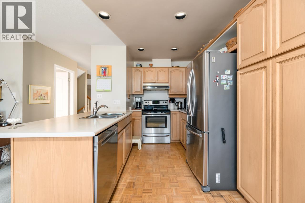 233 Waterleigh Drive, Vancouver, BC - Indoor Photo Showing Kitchen With Double Sink