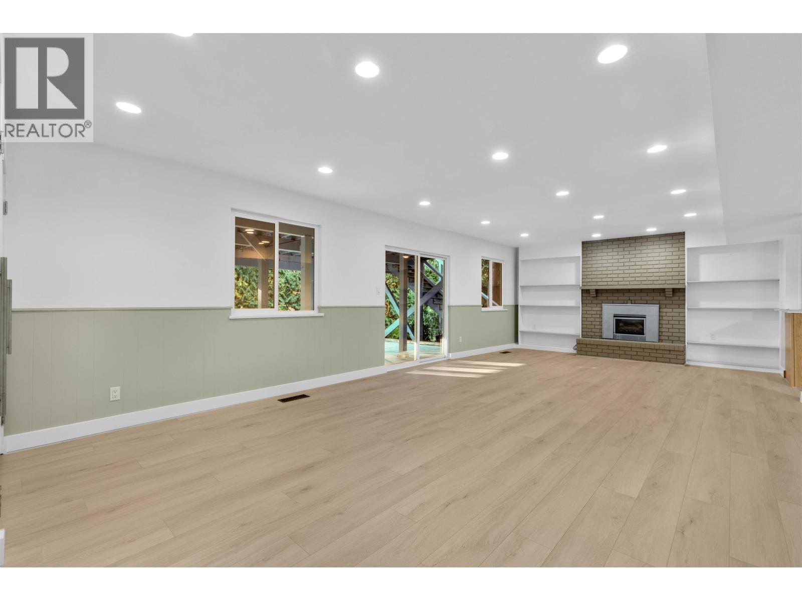 Basement 3062 Spencer Drive, West Vancouver, BC - Indoor With Fireplace