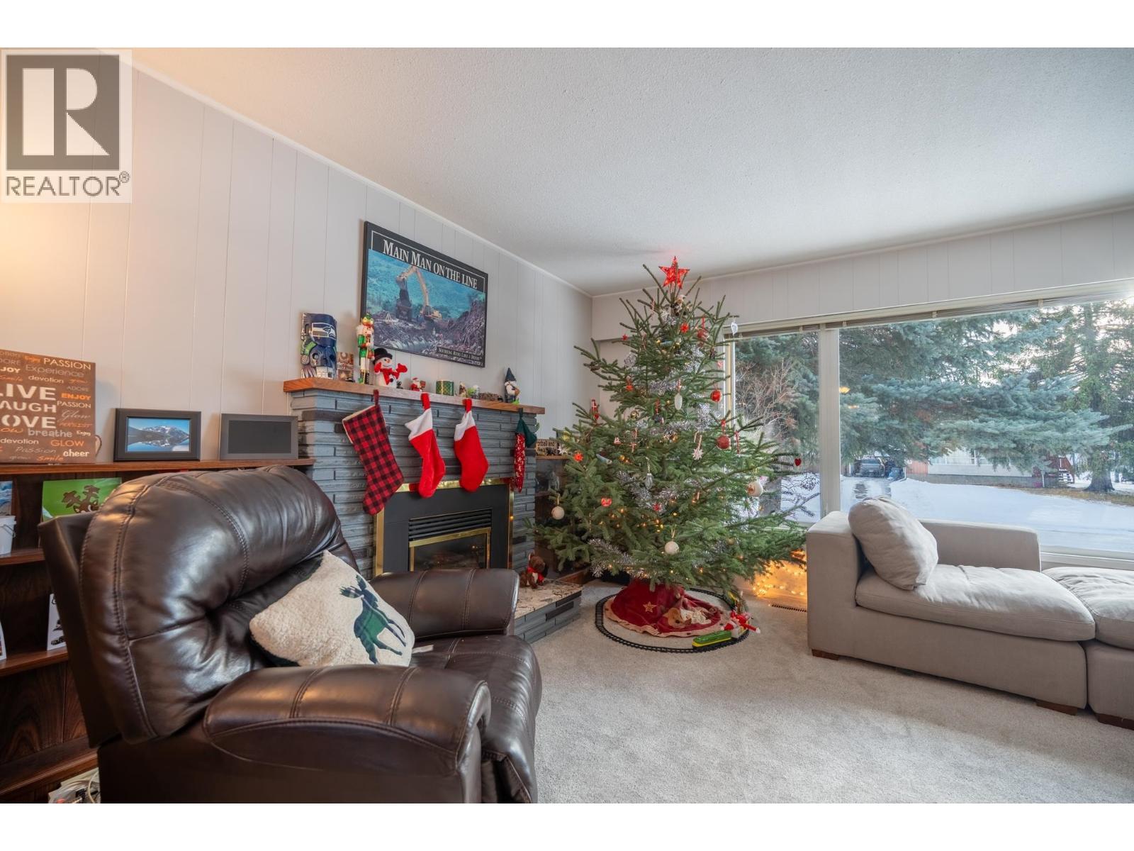 1050 Parsnip Crescent, Prince George, BC - Indoor Photo Showing Living Room With Fireplace