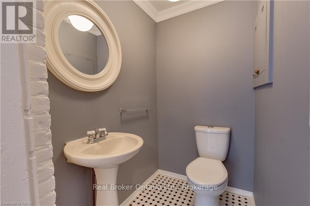 Main floor Powder Room - 808 Monmouth Road, Essex, ON - Indoor Photo Showing Bathroom