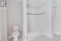 Full bath w/closet,shower+tub combo w/molding -