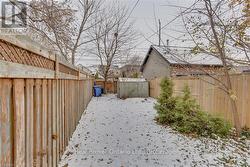 Fully Fenced Back Yard with access to the Alley -