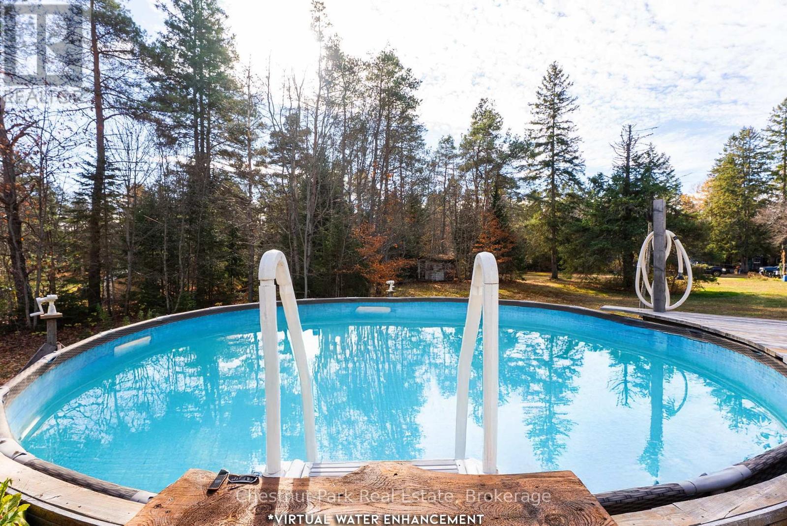 75 Pond Crescent, Huntsville (Chaffey), ON - Outdoor With Above Ground Pool With Backyard