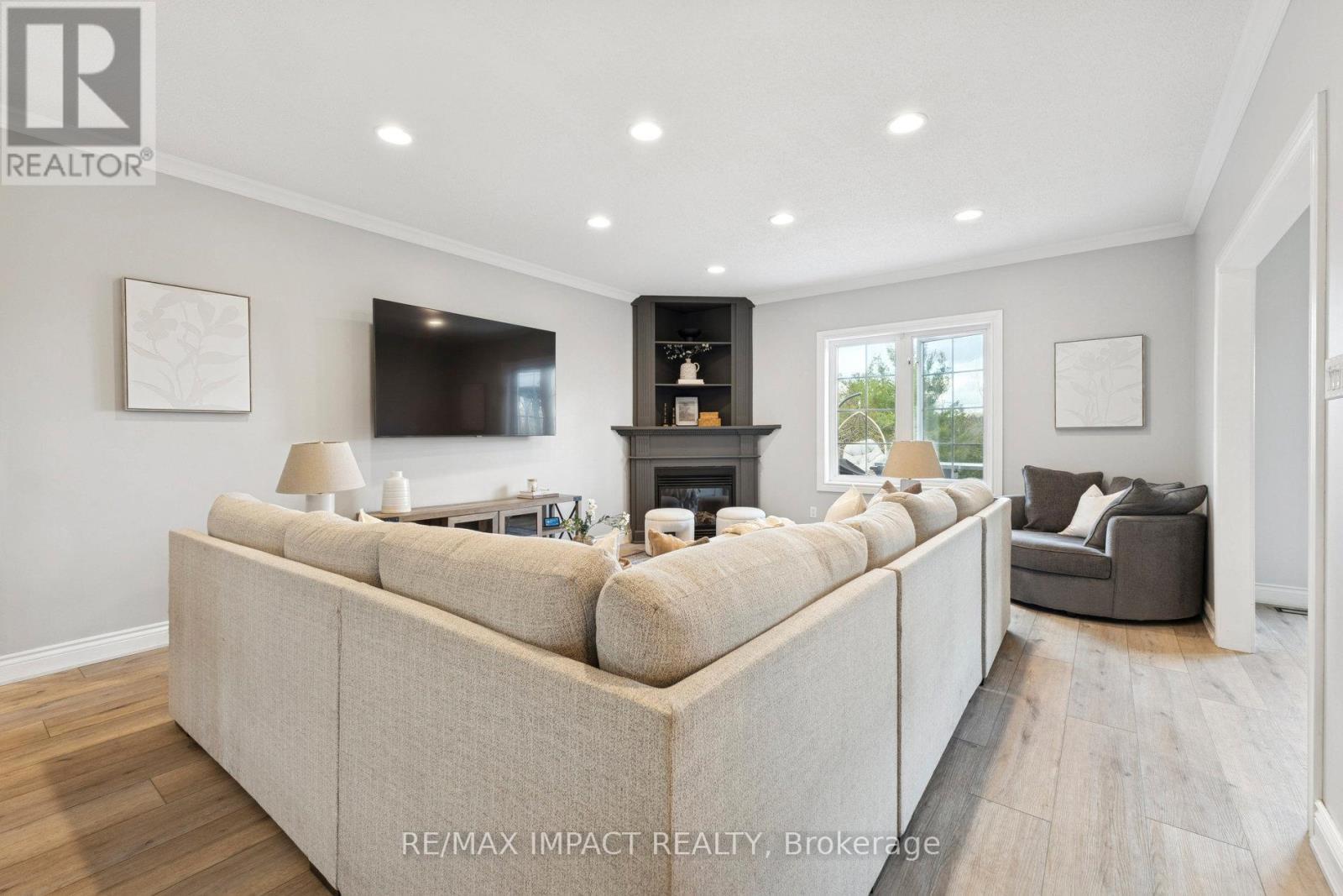 448 7A Highway, Cavan Monaghan (Cavan Twp), ON - Indoor Photo Showing Living Room With Fireplace
