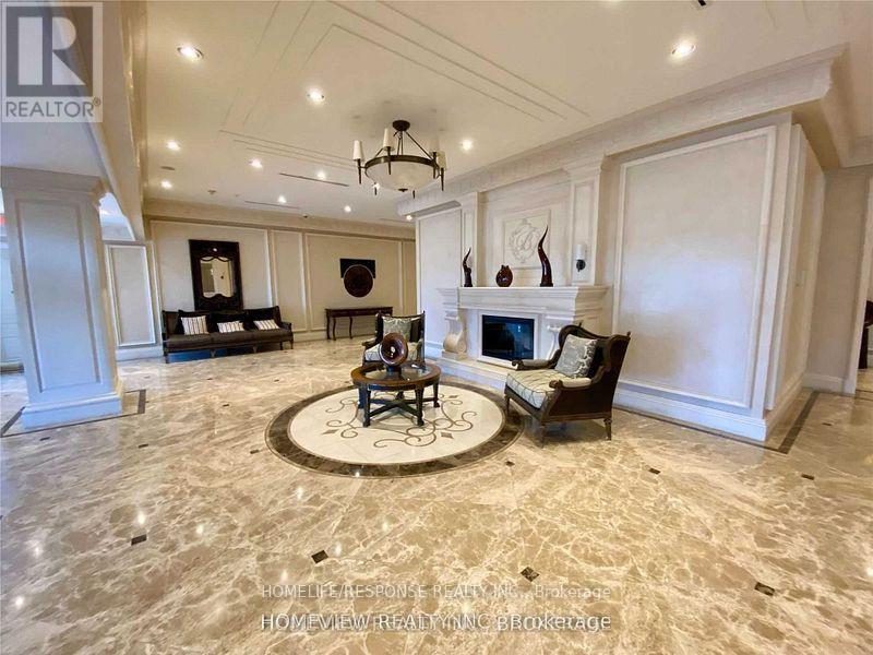 1006 - 9235 Jane Street, Vaughan, ON - Indoor With Fireplace