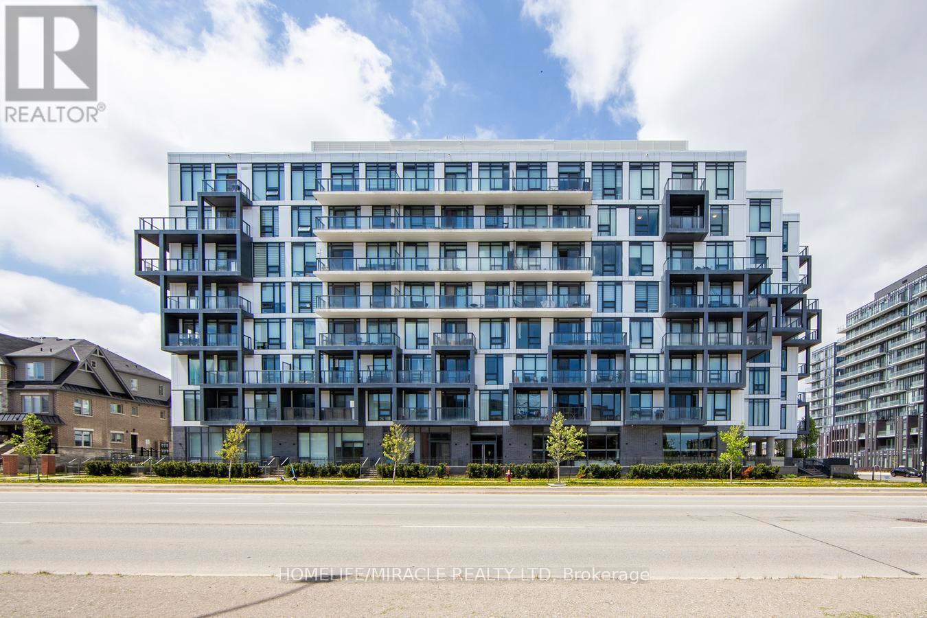 703 - 180 Veterans Drive, Brampton, ON - Outdoor With Balcony With Facade