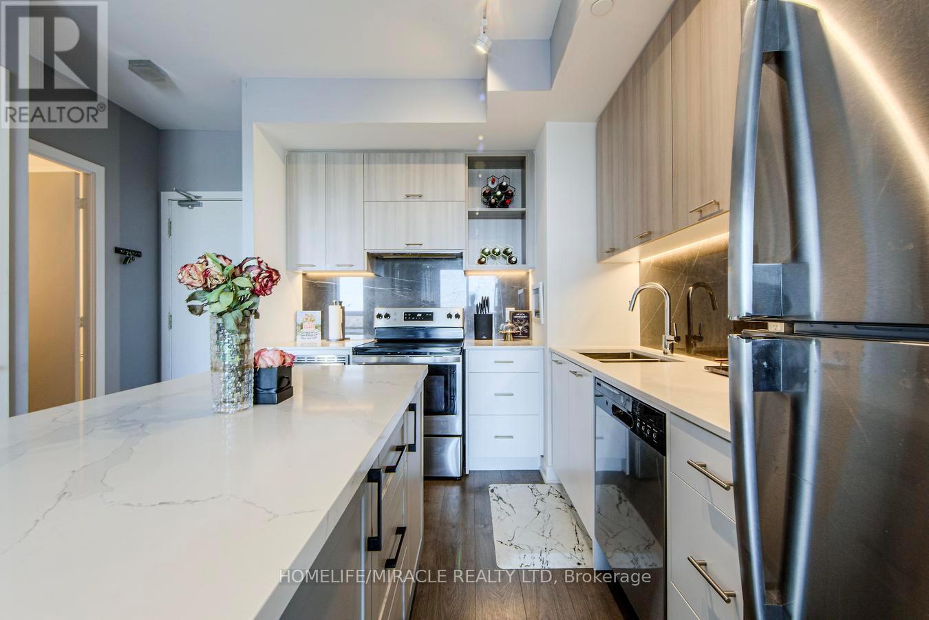 703 - 180 Veterans Drive, Brampton, ON - Indoor Photo Showing Kitchen With Stainless Steel Kitchen With Upgraded Kitchen