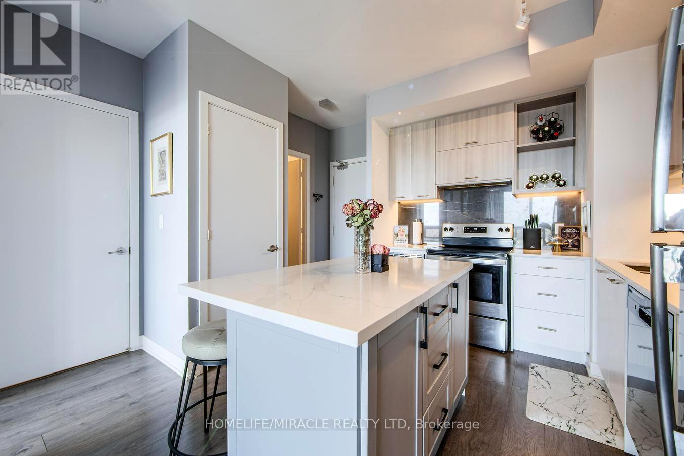 703 - 180 Veterans Drive, Brampton, ON - Indoor Photo Showing Kitchen With Stainless Steel Kitchen