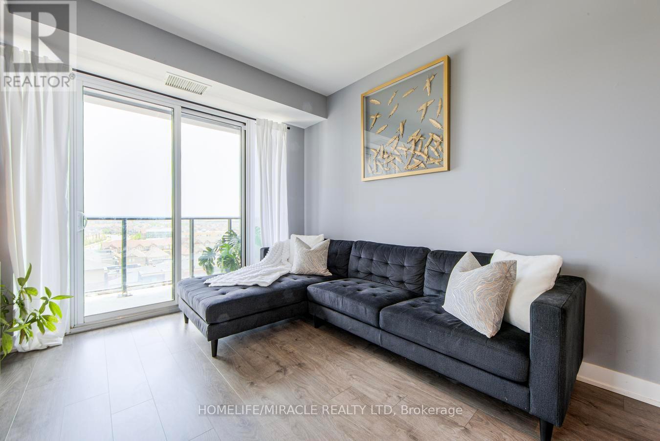 703 - 180 Veterans Drive, Brampton, ON - Indoor Photo Showing Living Room