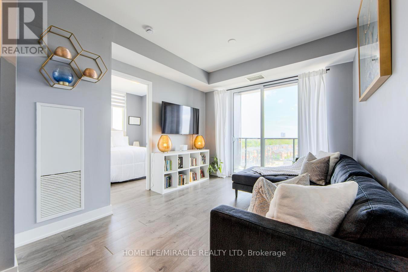 703 - 180 Veterans Drive, Brampton, ON - Indoor Photo Showing Living Room