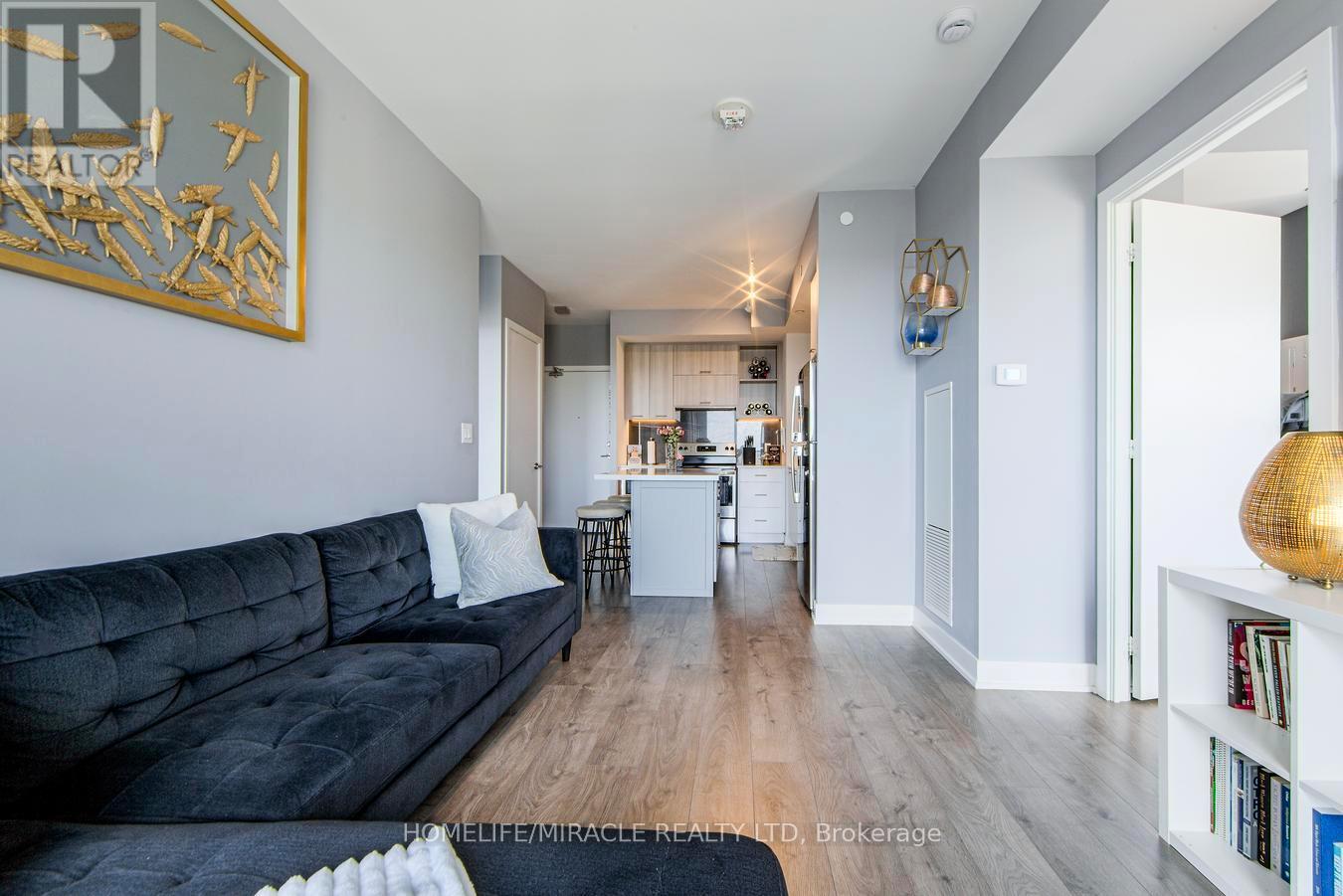 703 - 180 Veterans Drive, Brampton, ON - Indoor Photo Showing Living Room