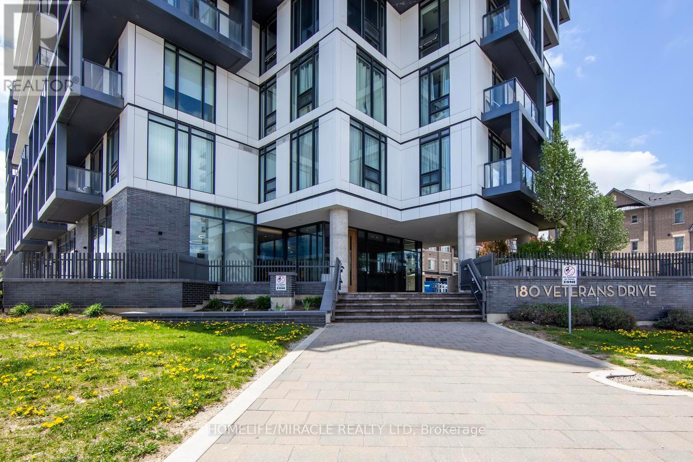703 - 180 Veterans Drive, Brampton, ON - Outdoor With Balcony With Facade