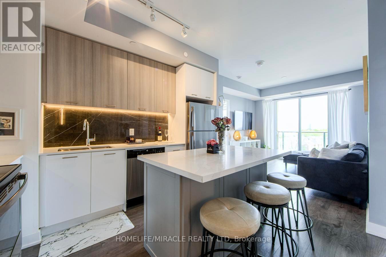 703 - 180 Veterans Drive, Brampton, ON - Indoor Photo Showing Kitchen With Double Sink