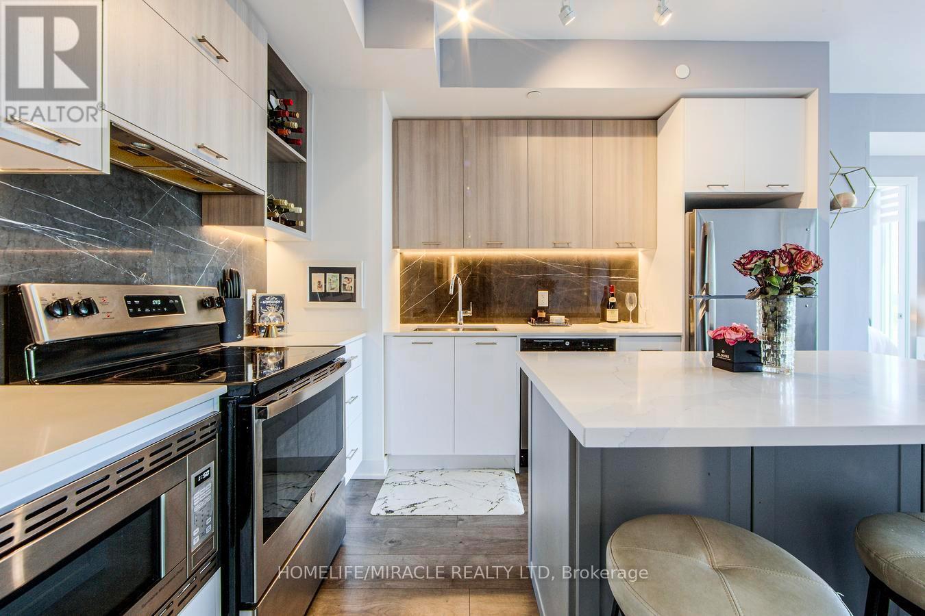 703 - 180 Veterans Drive, Brampton, ON - Indoor Photo Showing Kitchen With Stainless Steel Kitchen With Upgraded Kitchen