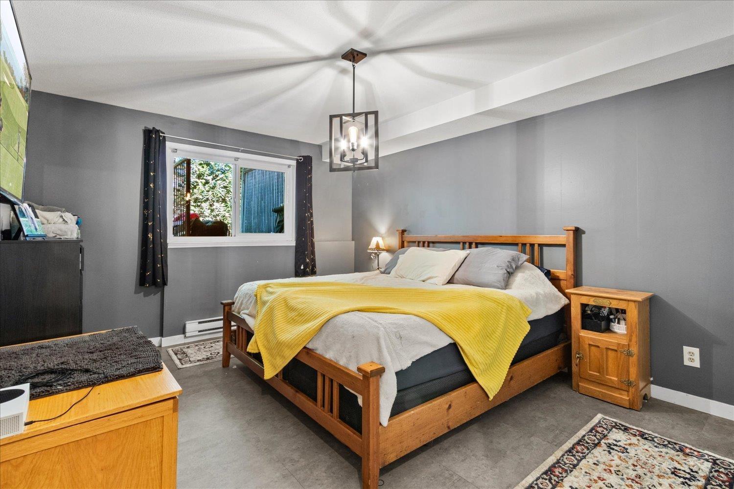 111 7694 Evans Road|Sardis West Vedder, Chilliwack, BC - Indoor Photo Showing Bedroom