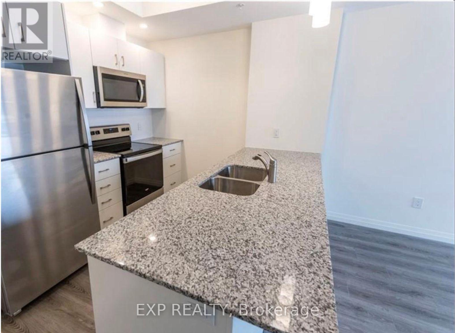 606 - 108 Garment Street, Kitchener, ON - Indoor Photo Showing Kitchen With Stainless Steel Kitchen With Double Sink With Upgraded Kitchen