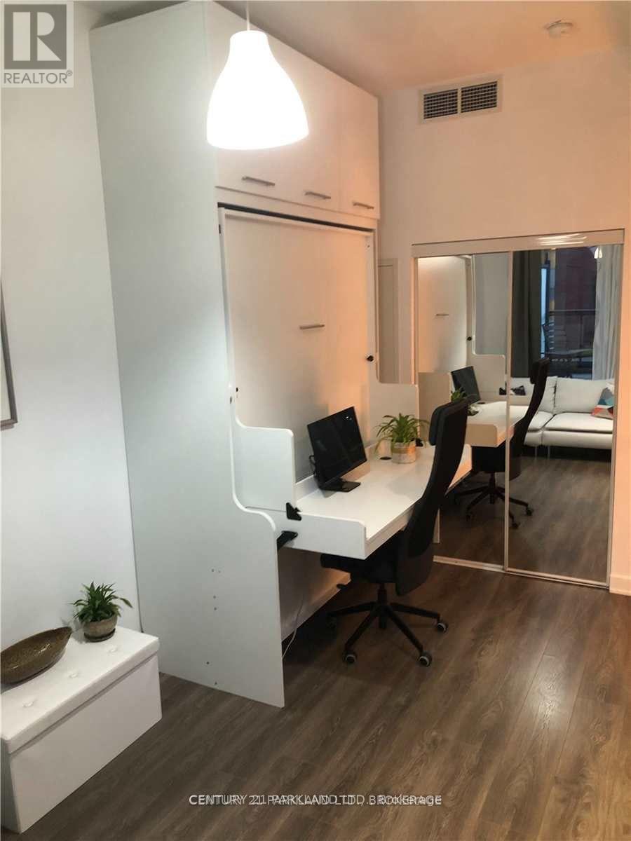 Murphy Bed - 428 - 55 Regent Park Boulevard, Toronto, ON - Indoor Photo Showing Other Room