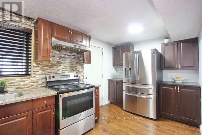 7-13 - 13 Lotherton Pathway, Toronto, ON - Indoor Photo Showing Kitchen