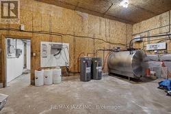 3 hot water tanks in milk house. -