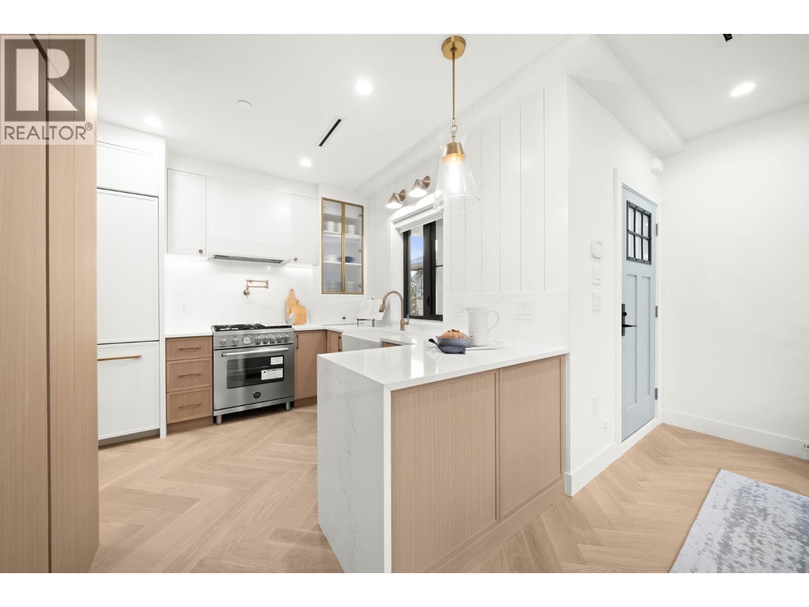 2 2791 W 21St Avenue, Vancouver, BC - Indoor Photo Showing Kitchen With Upgraded Kitchen