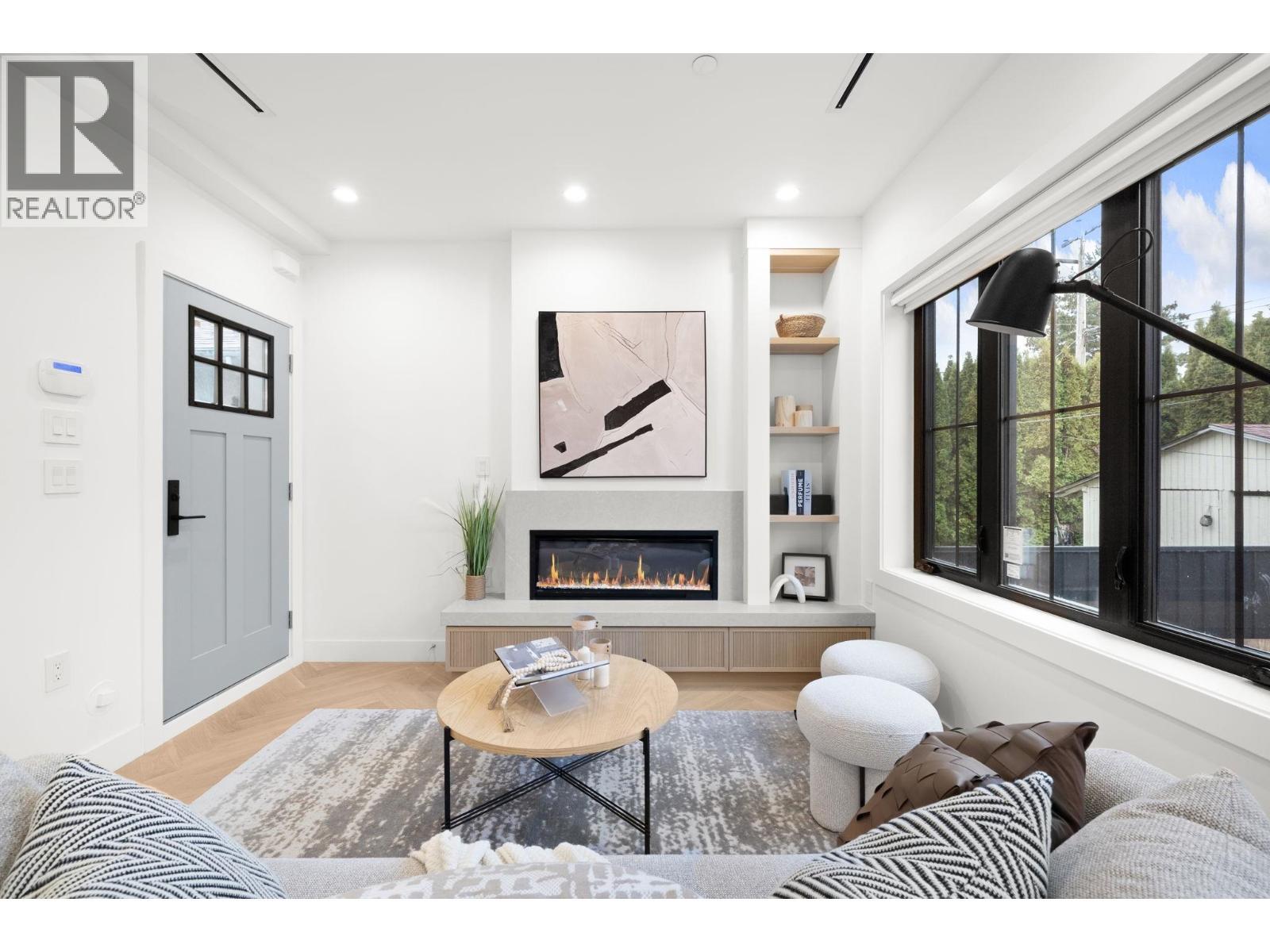 2 2791 W 21St Avenue, Vancouver, BC - Indoor Photo Showing Living Room With Fireplace