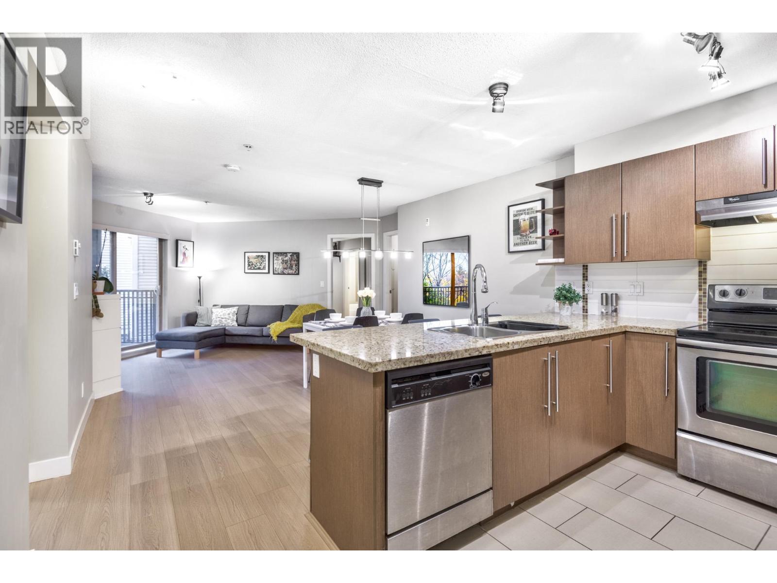 209 2088 Beta Avenue, Burnaby, BC - Indoor Photo Showing Kitchen With Double Sink