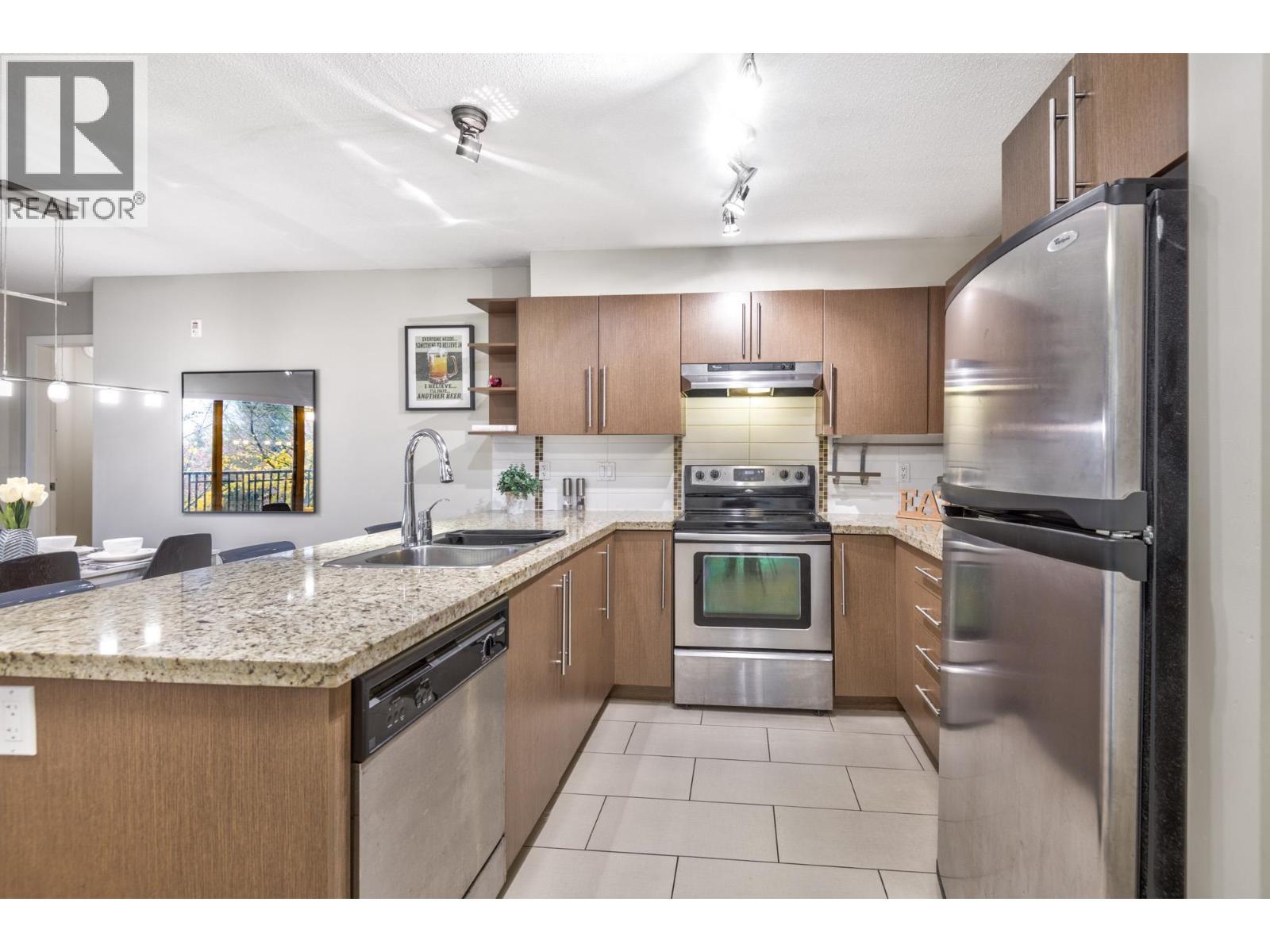 209 2088 Beta Avenue, Burnaby, BC - Indoor Photo Showing Kitchen With Double Sink