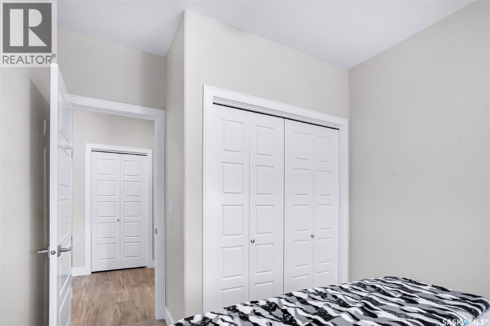 212 105 Willis Crescent, Saskatoon, SK - Indoor Photo Showing Bedroom