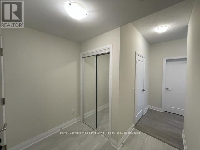 140 - 16 Concord Place, Grimsby (Grimsby Beach), ON - Indoor Photo Showing Other Room