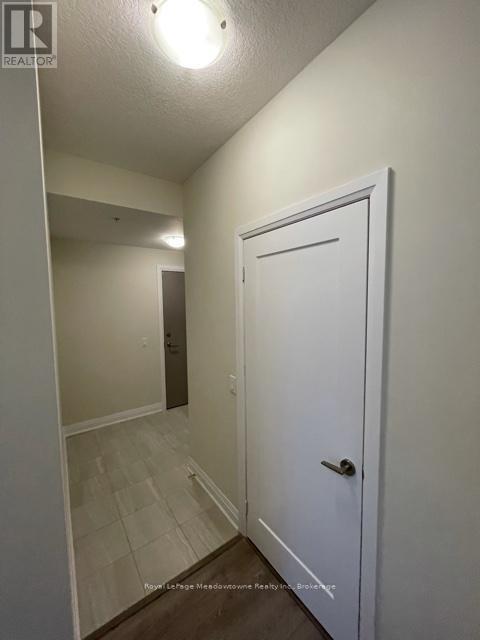 140 - 16 Concord Place, Grimsby (Grimsby Beach), ON - Indoor Photo Showing Other Room