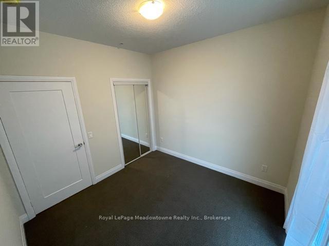 140 - 16 Concord Place, Grimsby (Grimsby Beach), ON - Indoor Photo Showing Other Room